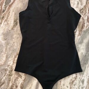 $68 Like new Spanks Black Sleeveless Bodysuit medium